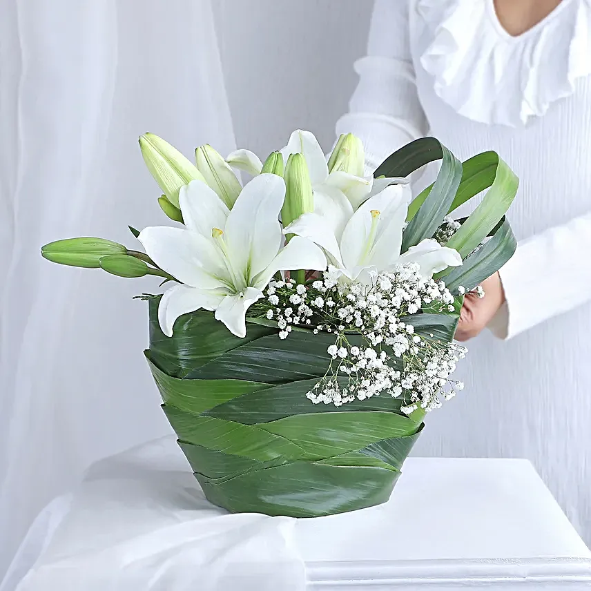 Angel In White Floral Arrangement