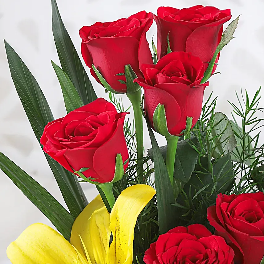 Asiatic Lilies & Red Roses Cane Basket Arrangement