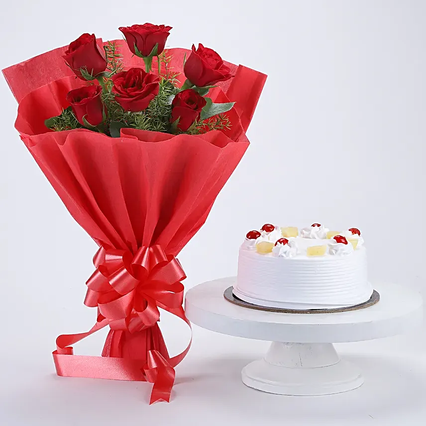 Delightful Divine - Bunch of 6 Red Roses with Pineapple Cake 500gms.