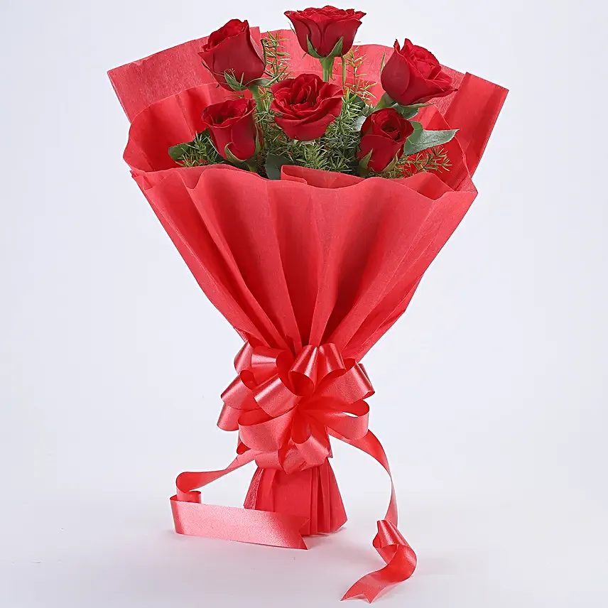 Delightful Divine - Bunch of 6 Red Roses with Pineapple Cake 500gms.