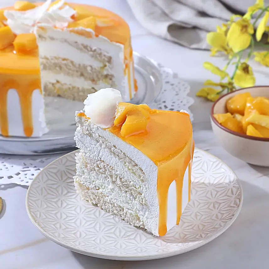 Dripping Mango Cream Cake Eggless