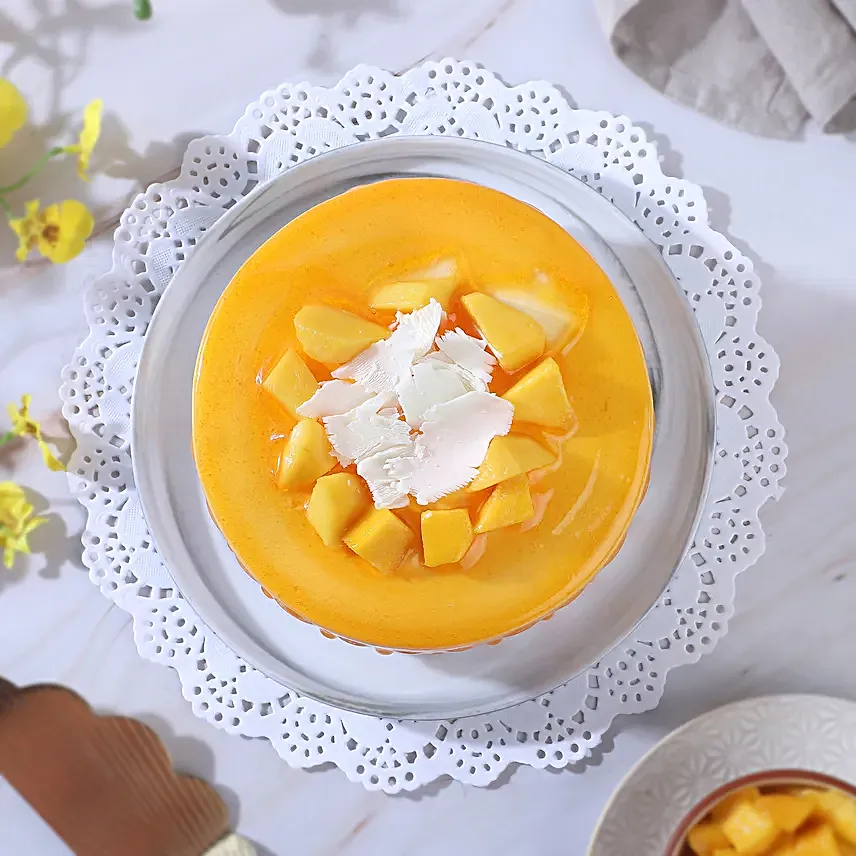 Dripping Mango Cream Cake Eggless