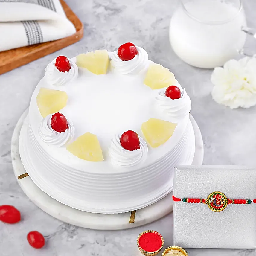 Enigmatic Ganesha Essence Rakhi N Pineapple Cake