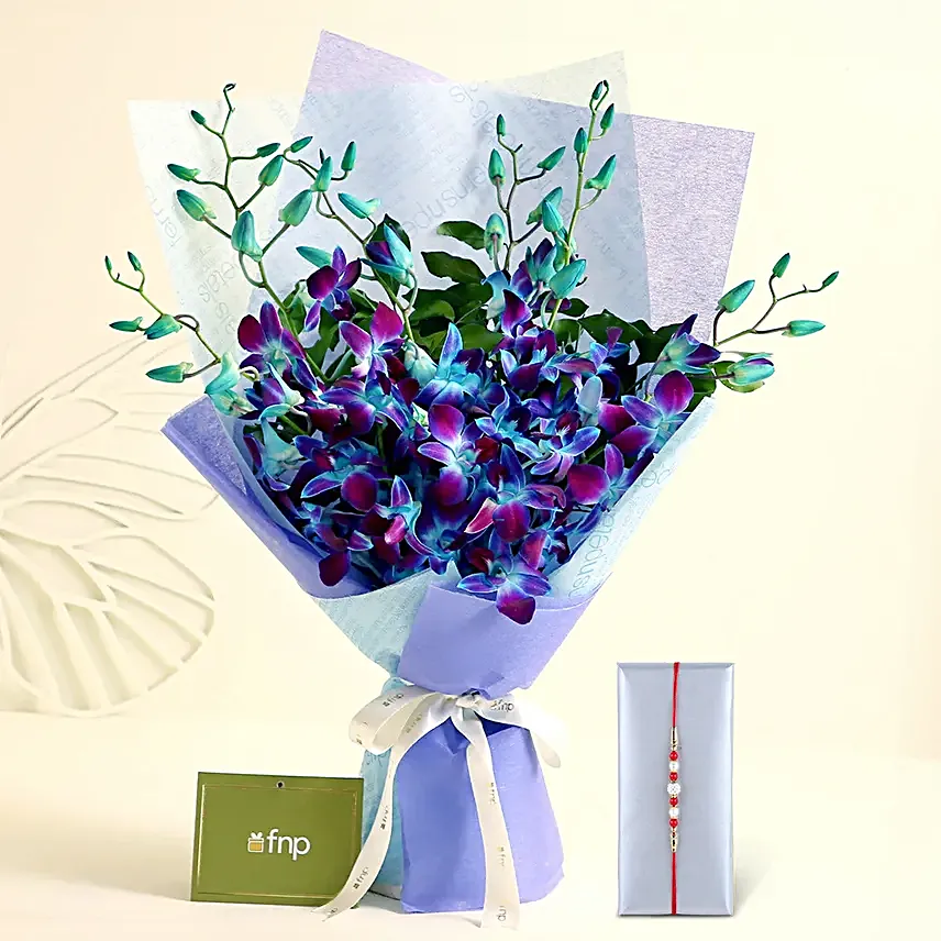 Ethnic Pearl Rakhi N Enchanting Orchids Bouquet