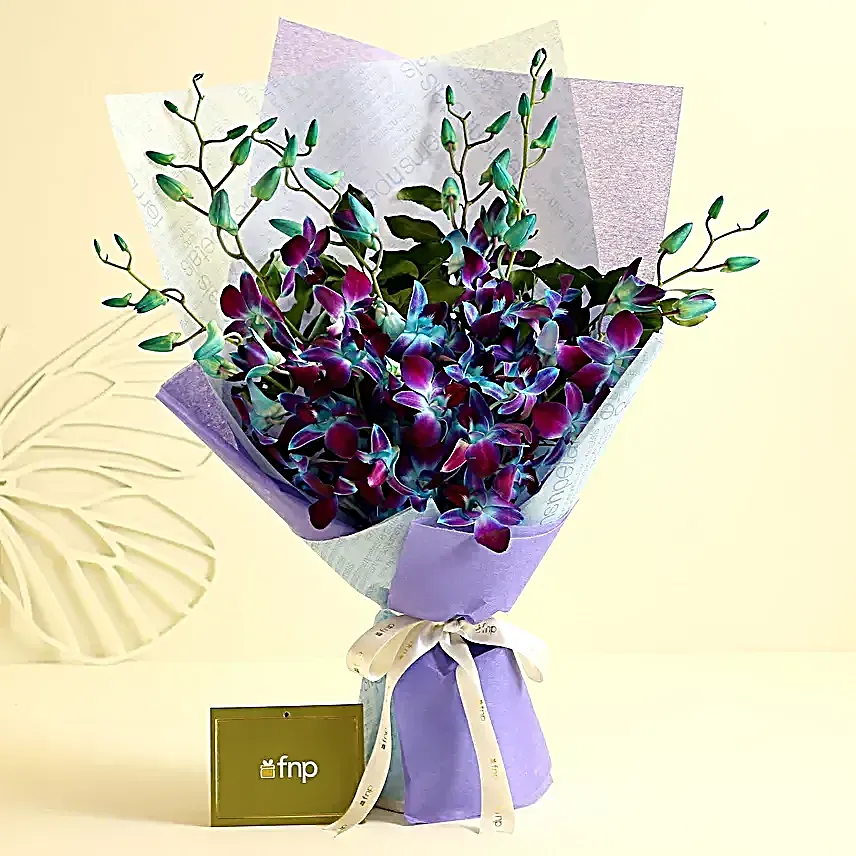 Ethnic Pearl Rakhi N Enchanting Orchids Bouquet