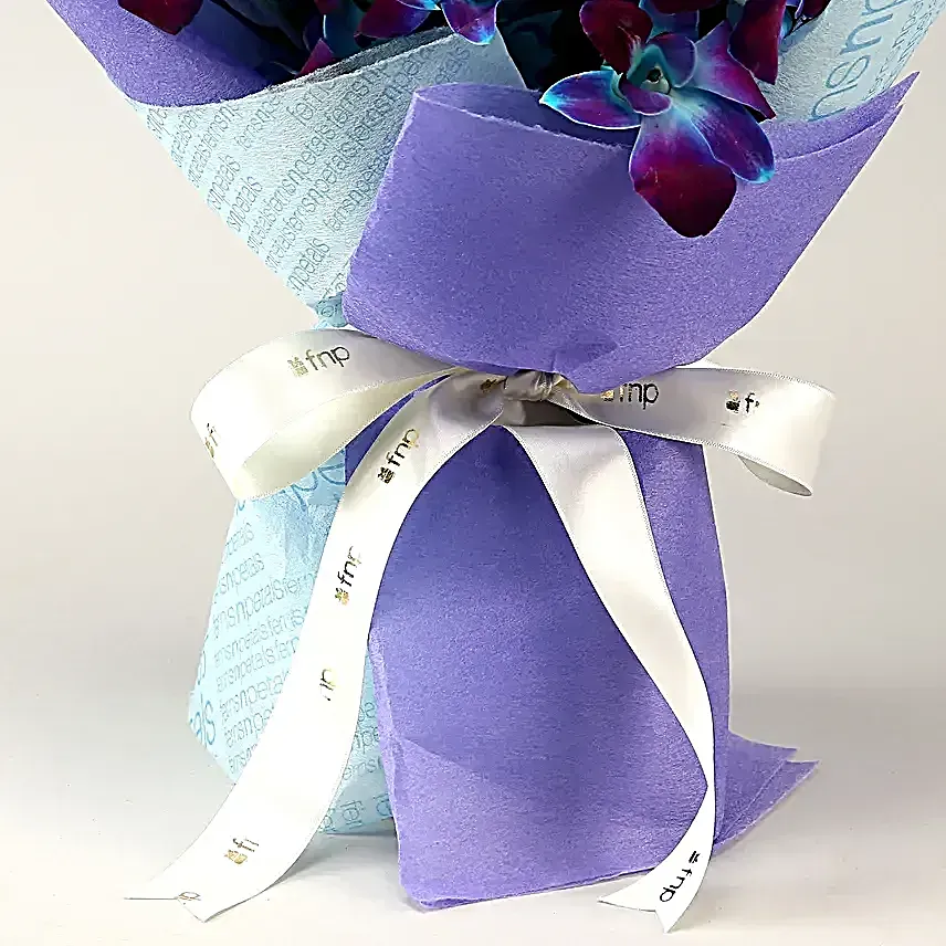 Ethnic Pearl Rakhi N Enchanting Orchids Bouquet