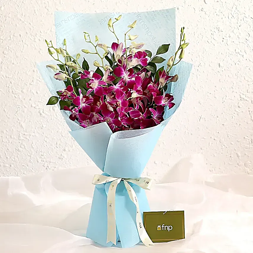 Ethnic Pearl Rakhi N Orchids Beauty Bouquet
