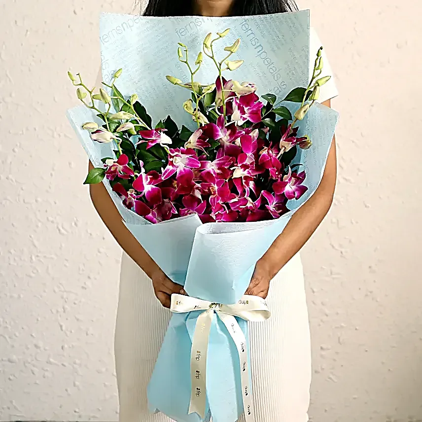 Ethnic Pearl Rakhi N Orchids Beauty Bouquet