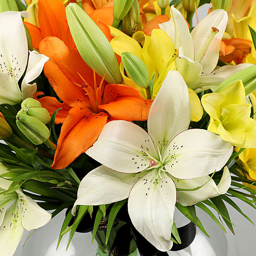 Fragrant Mix Of Lilies In Fishbowl Vases