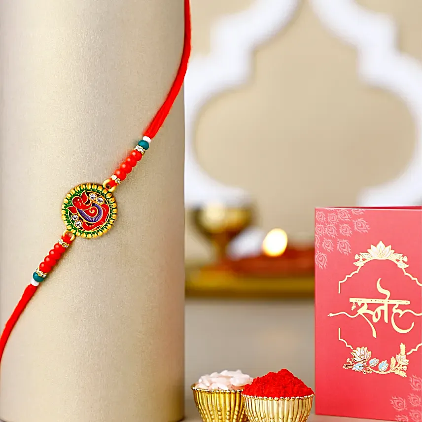 Ganesha Blessings Rakhi Set N Tropical Pineapple Cake