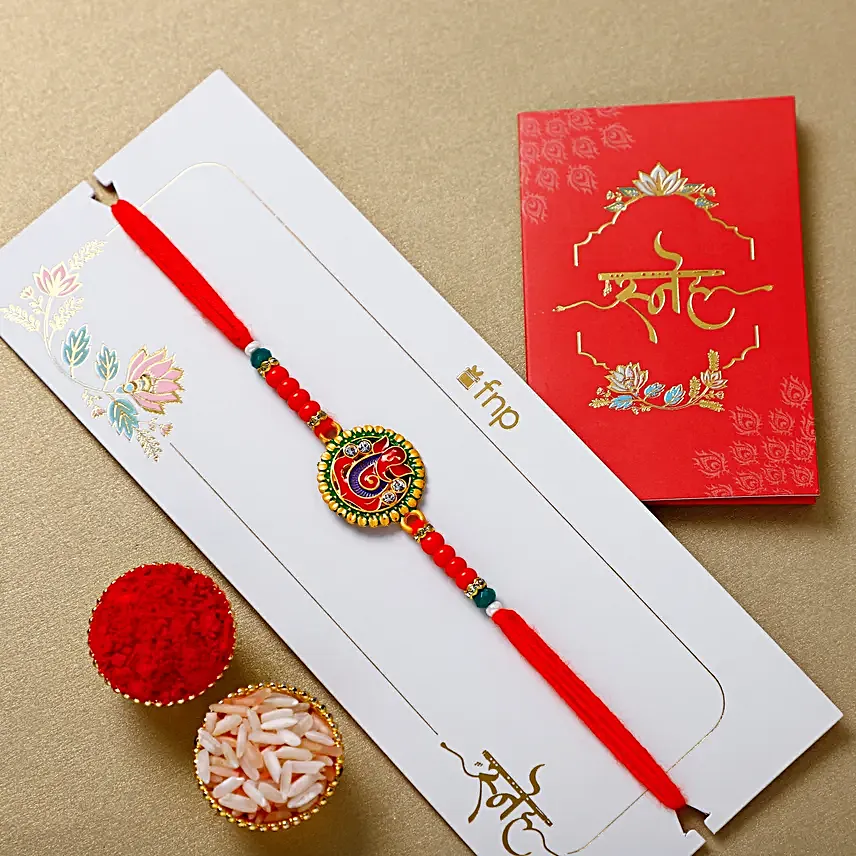 Ganesha Blessings Rakhi Set N Truffle Delight Cake Combo