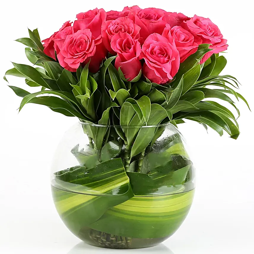 Love in the air - 30 pink roses are nicely arranged in a fish bowl glass vase.