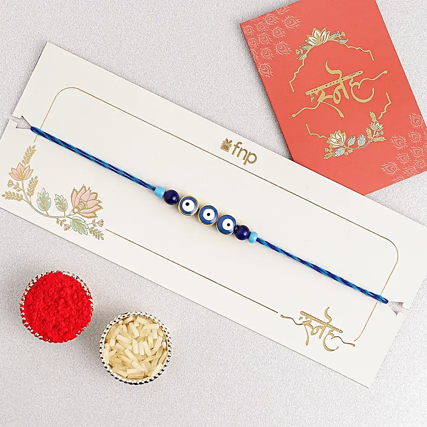 Minimalistic Navy Evil Eye Rakhi N Butterscotch Delight Half Kg
