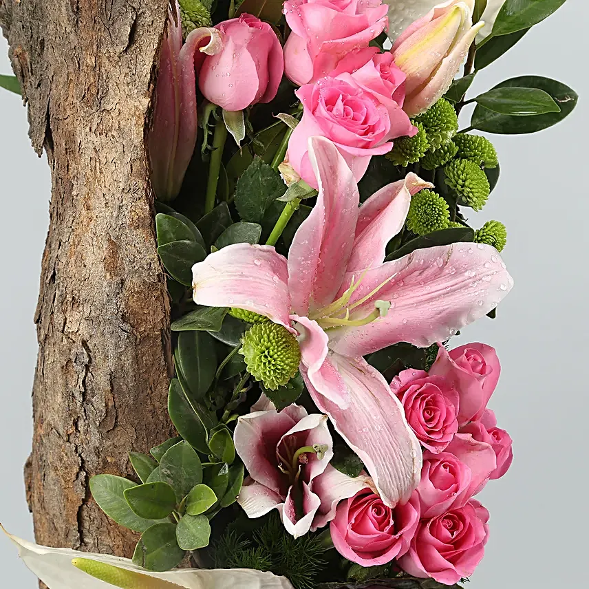 Mixed Flowers In Cylindrical Wooden Vase