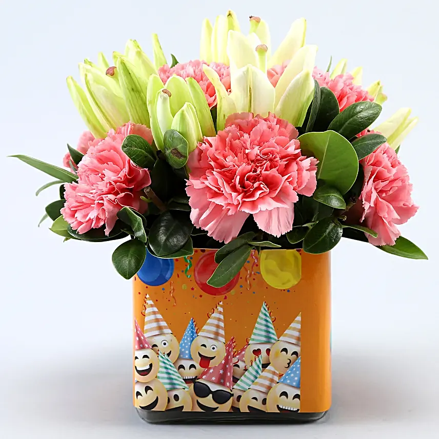 Pink Carnations and White Lilies In Orange Birthday Vase