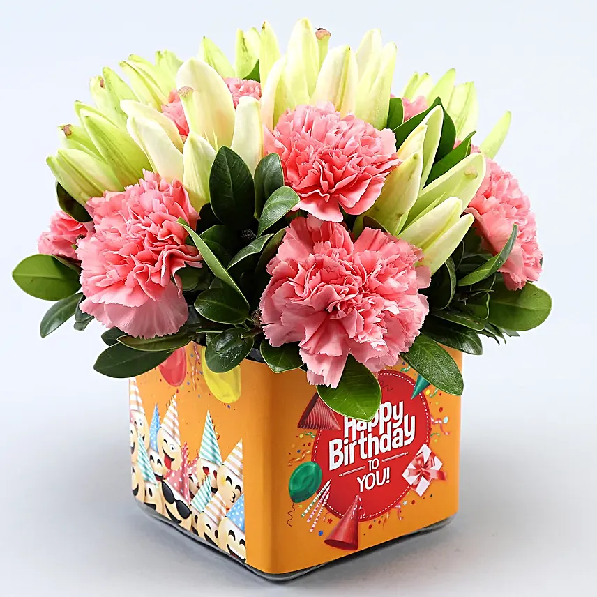 Pink Carnations and White Lilies In Orange Birthday Vase