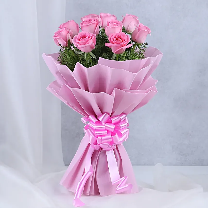 Pink Roses with Cake - Bouquet of 10 pink roses with in paper packing and 500 grams of chocolate truffle cake.