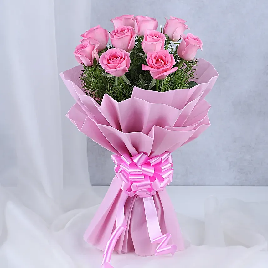 Pink Roses with Cake - Bouquet of 10 pink roses with in paper packing and 500 grams of chocolate truffle cake.