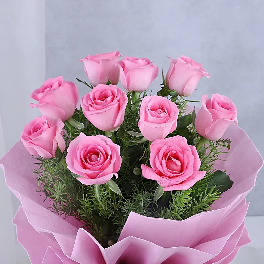 Pink Roses with Cake - Bouquet of 10 pink roses with in paper packing and 500 grams of chocolate truffle cake.