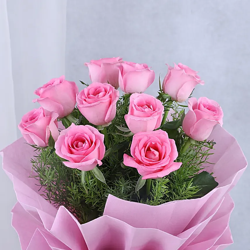 Pink Roses with Cake - Bouquet of 10 pink roses with in paper packing and 500 grams of chocolate truffle cake.
