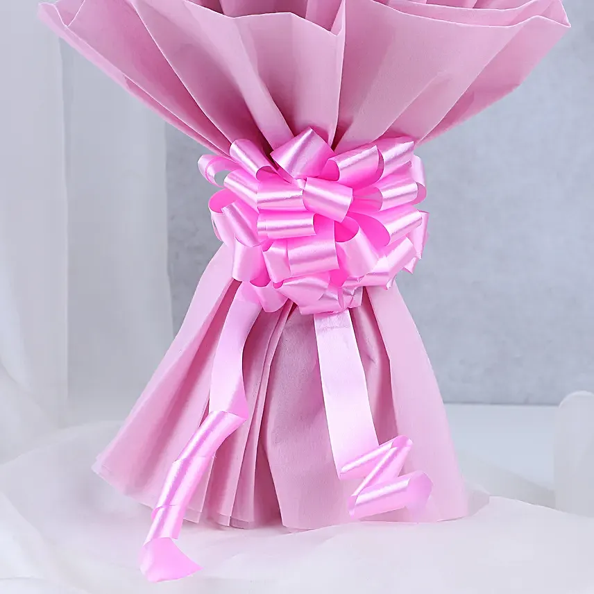 Pink Roses with Cake - Bouquet of 10 pink roses with in paper packing and 500 grams of chocolate truffle cake.