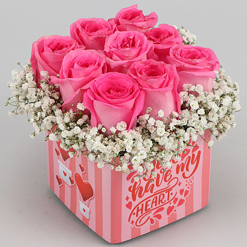 pink rose in vase arrangement for vday