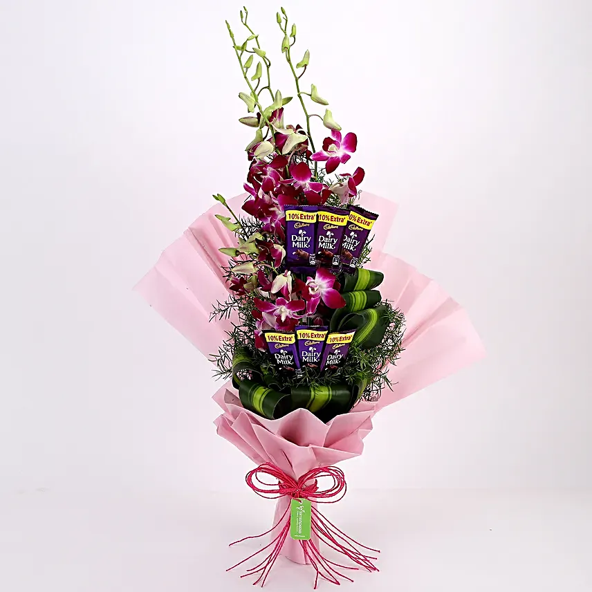 Online Dairy Milk Orchids Bouquet And Chocolate Cake