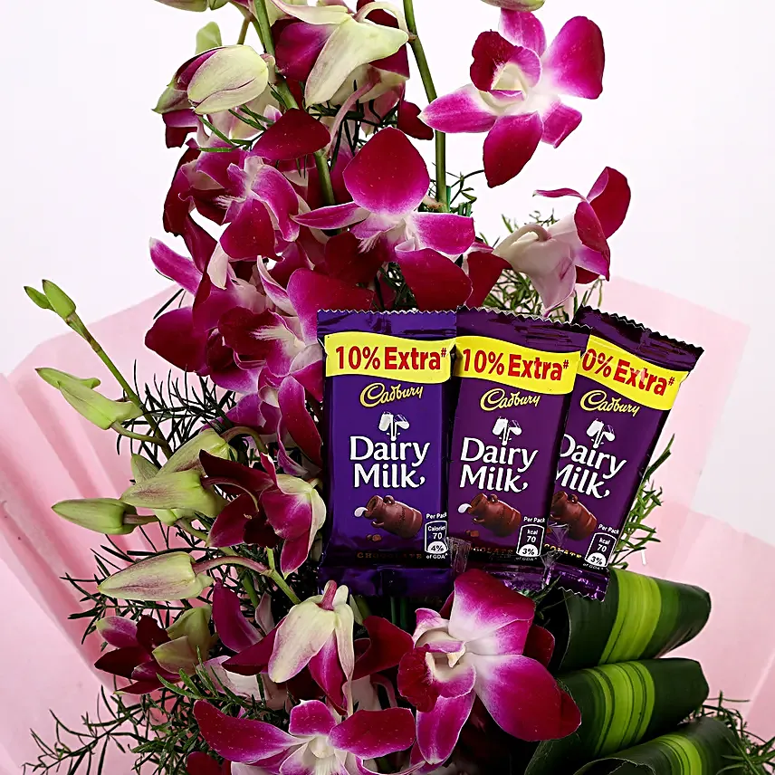 Online Dairy Milk Orchids Bouquet And Chocolate Cake