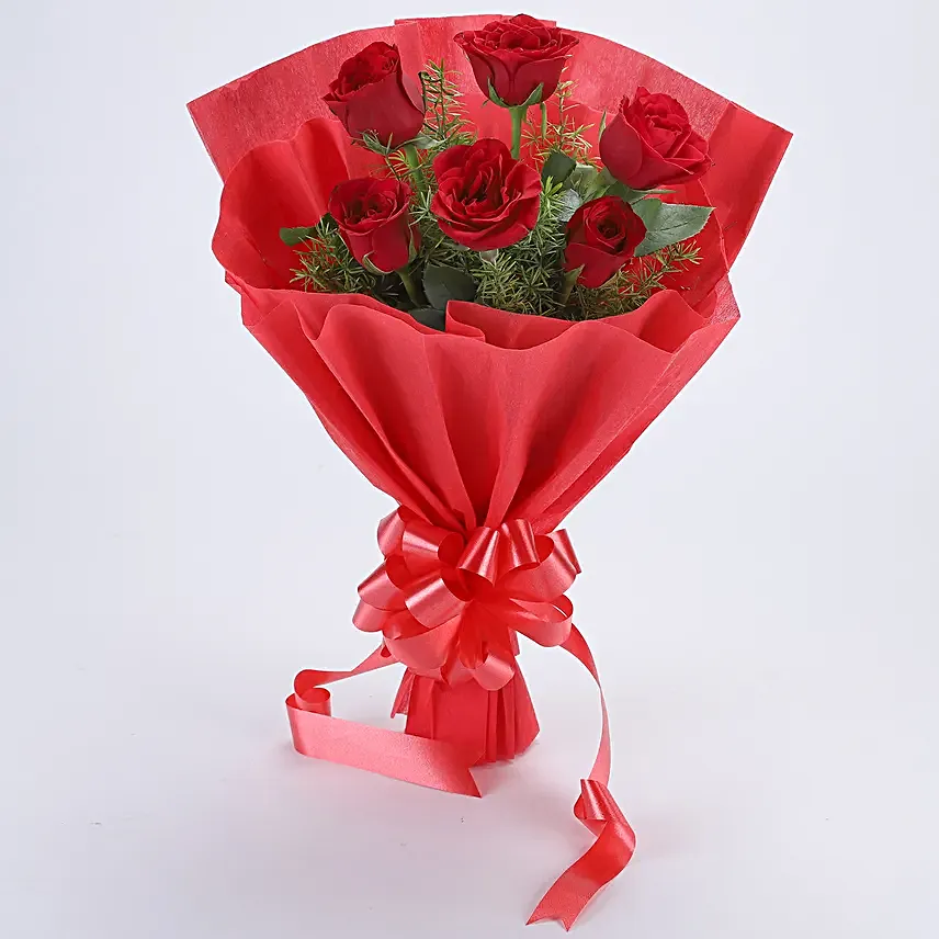 Red Sensation - Bunch of 6 Red Roses with Cadbury Celebration  box.