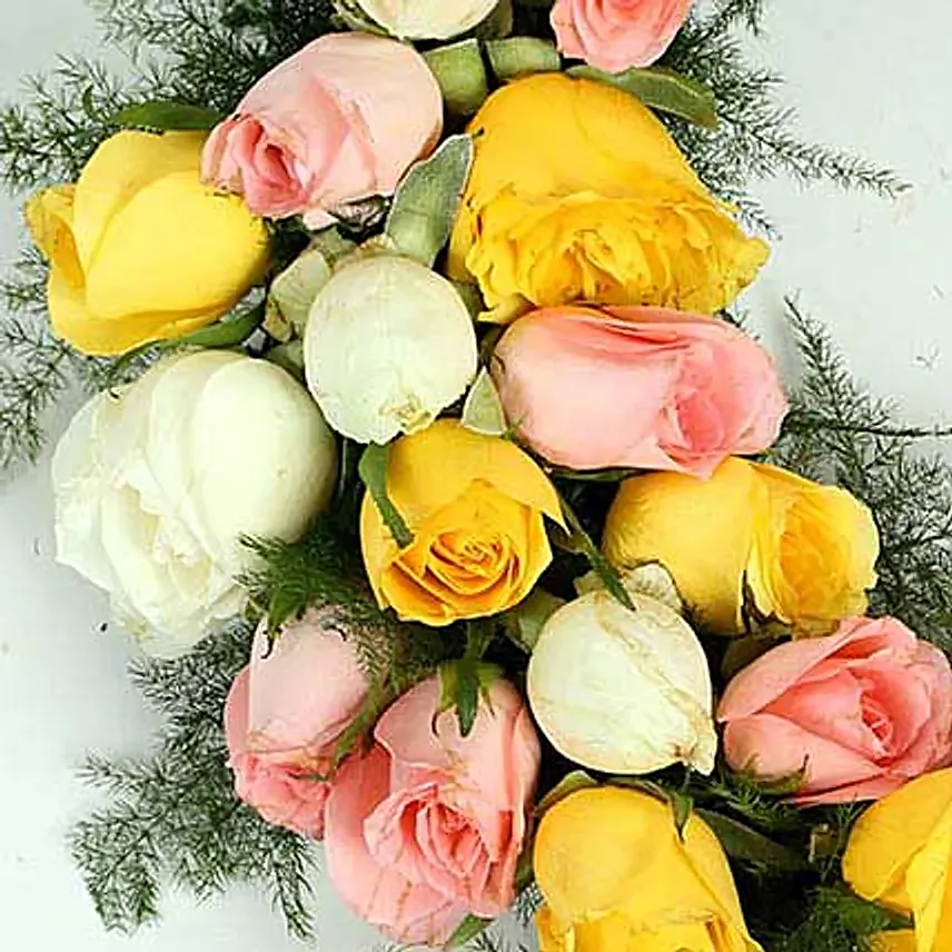 Roses and seasonal filler in wreath
