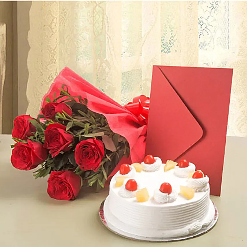 Roses N Cake Hamper - Bunch of 6 Red Roses, 500gm Pineapple Cake with Greeting Card.