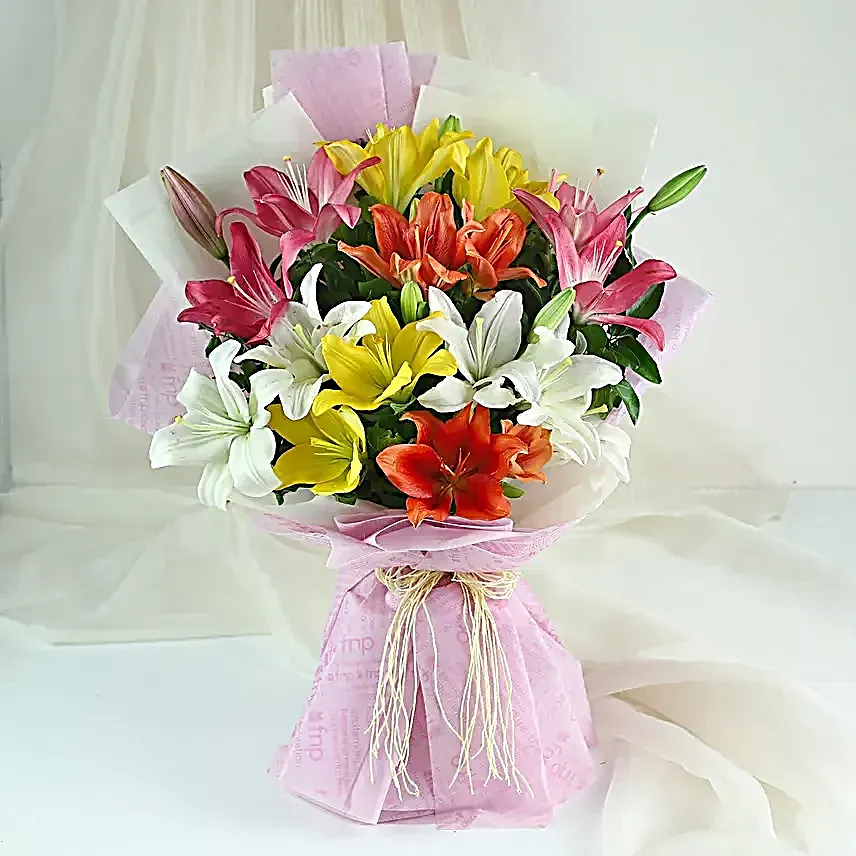 Rudraksha Rakhi N Asiatic Lilies Sweet Bouquet