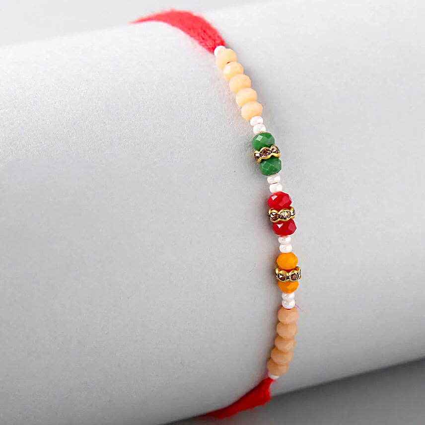 Serene Pearl Motif Rakhi