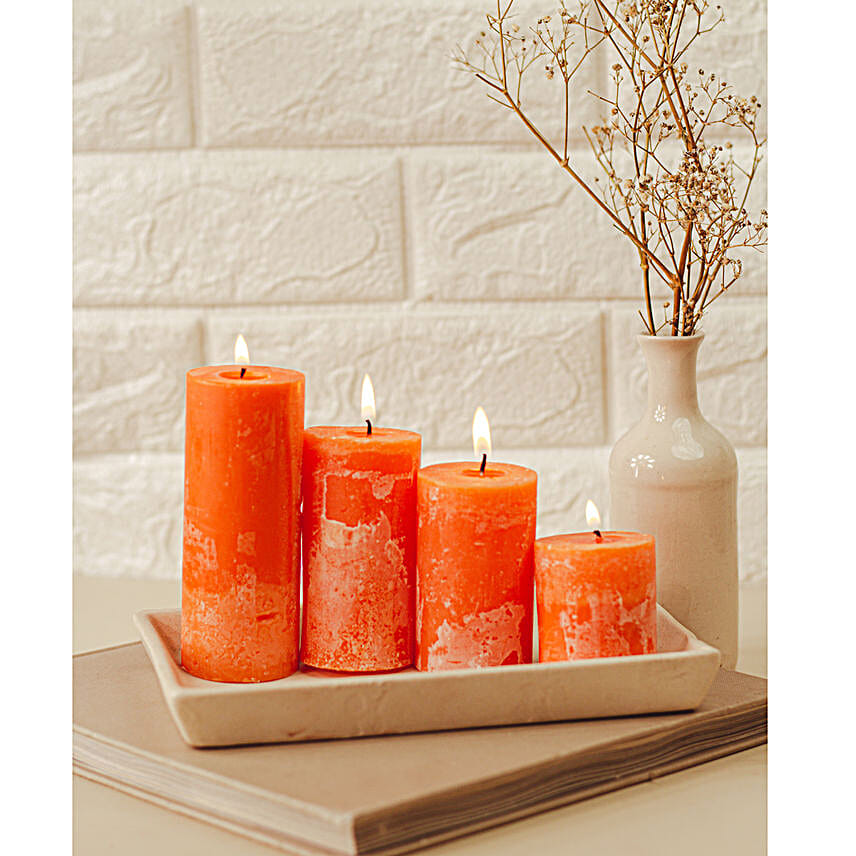 Set Of 4 Orange Pillar Candles Cinnamon