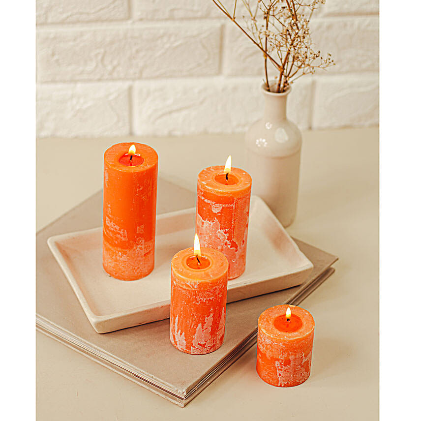 Set Of 4 Orange Pillar Candles Cinnamon