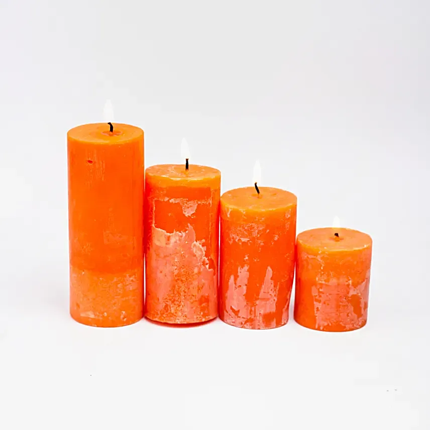 Set Of 4 Orange Pillar Candles Cinnamon
