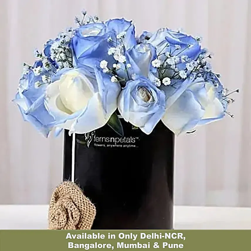blue roses arrangement in black box