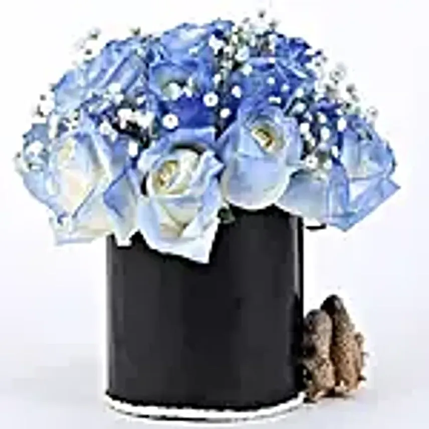 blue roses arrangement in black box