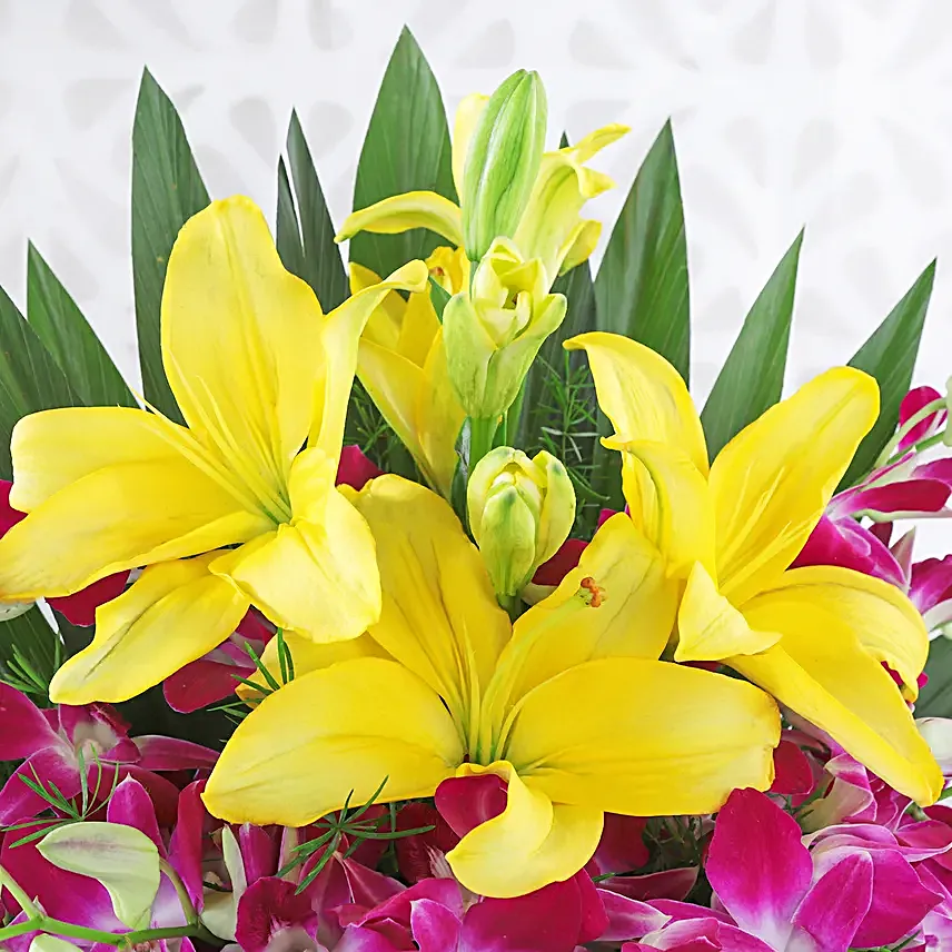 Timeless Elegance - Basket arrangement of 6 Purple Orchids with 2 yellow lilies.