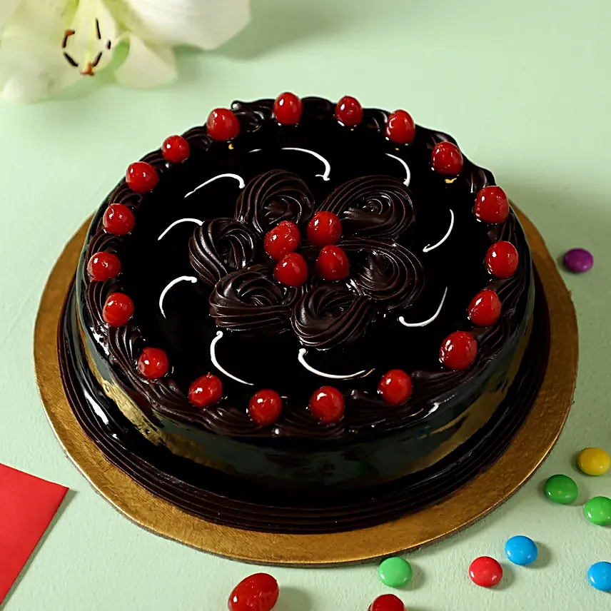 truffle cake with cherry topper
