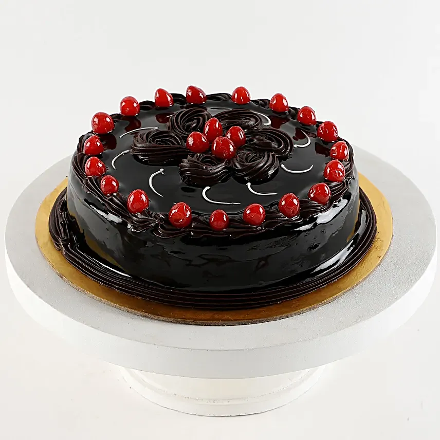 truffle cake with cherry topper