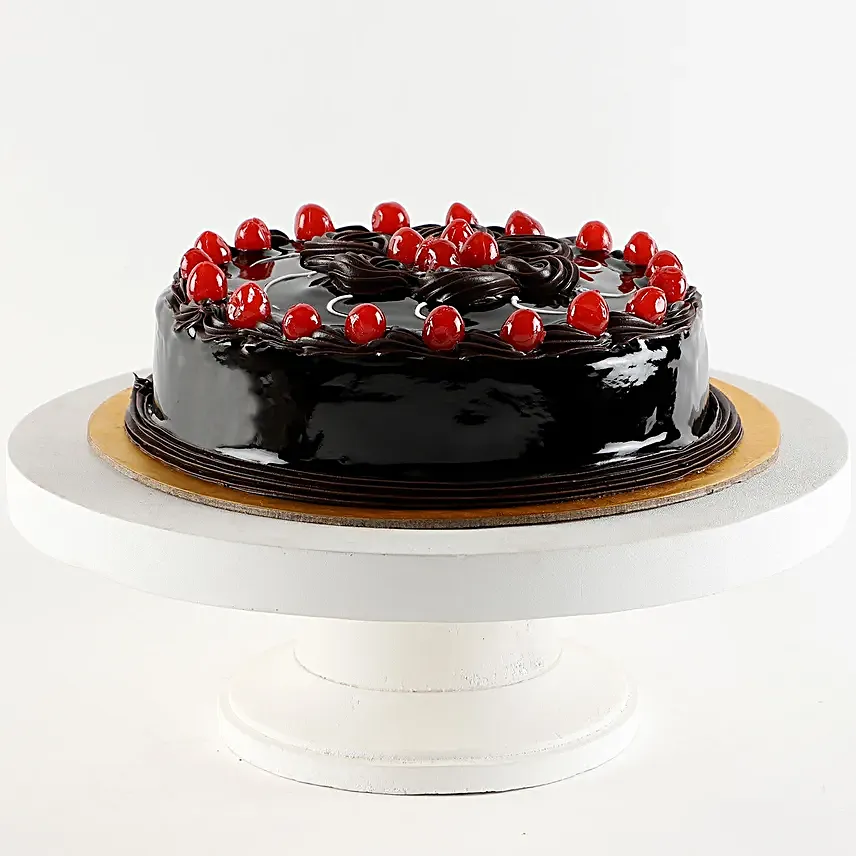 truffle cake with cherry topper