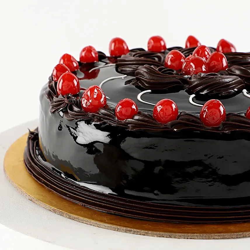 truffle cake with cherry topper