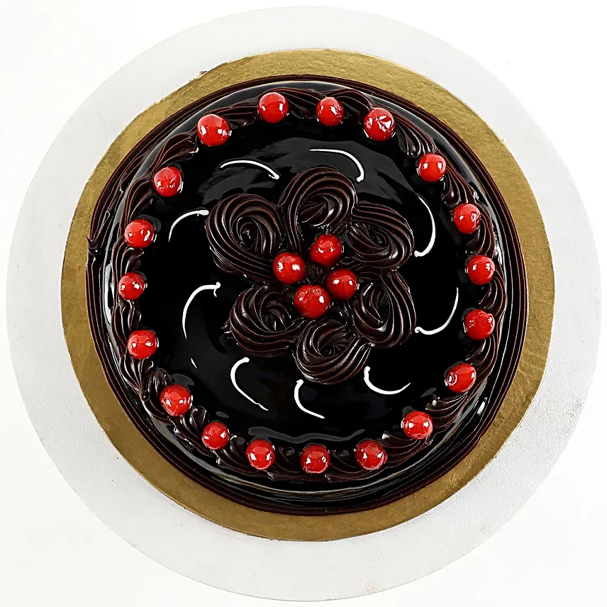 truffle cake with cherry topper