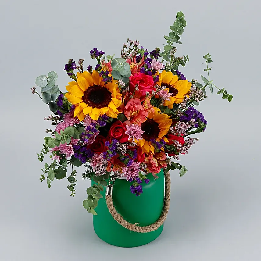 Vibrant Mixed Flowers Green Jar