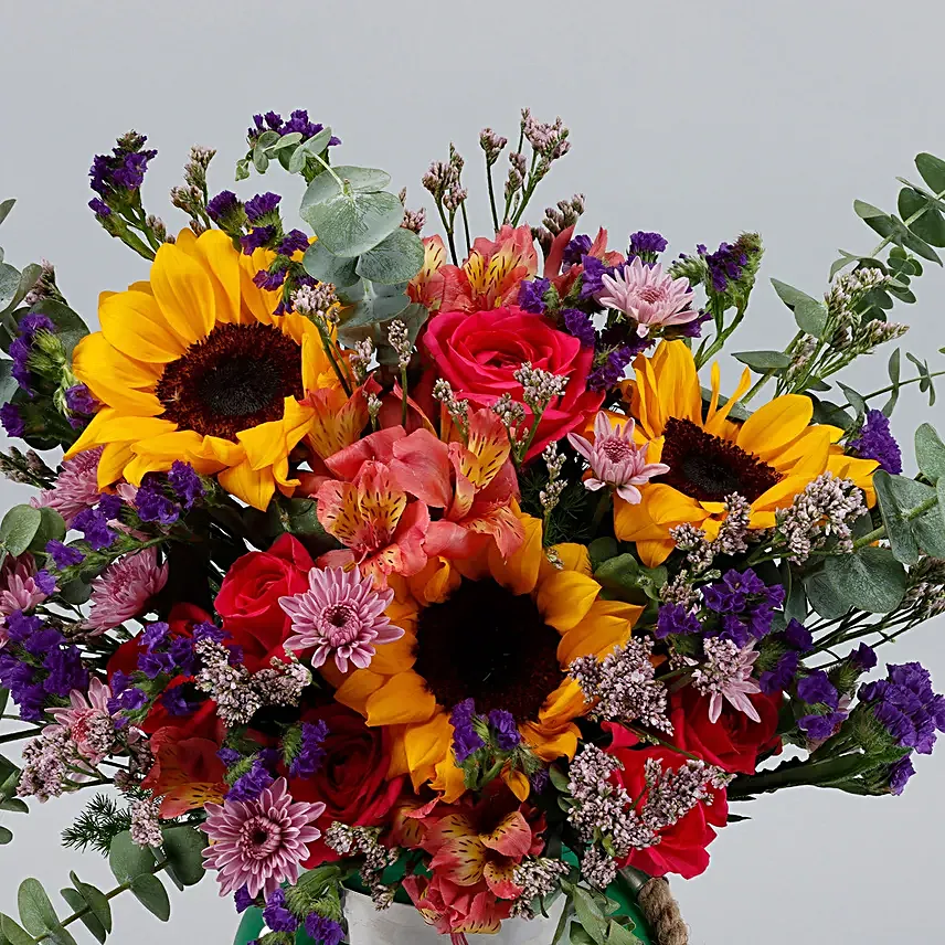 Vibrant Mixed Flowers Green Jar
