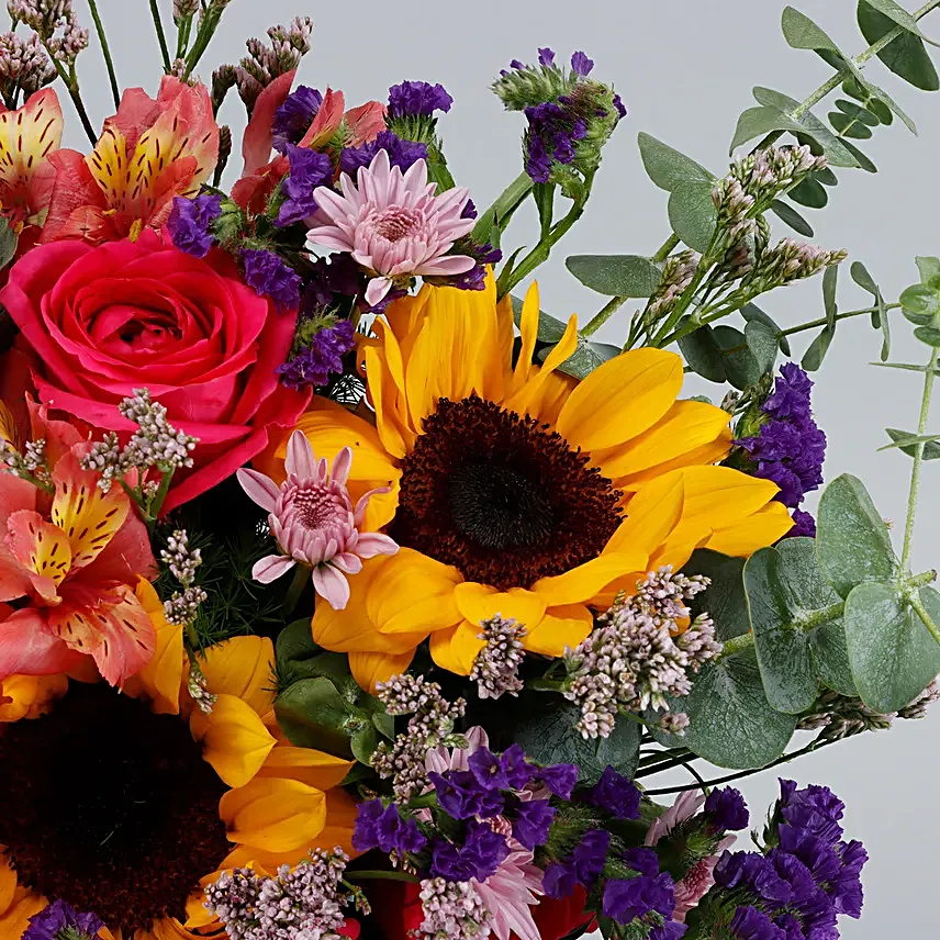 Vibrant Mixed Flowers Green Jar