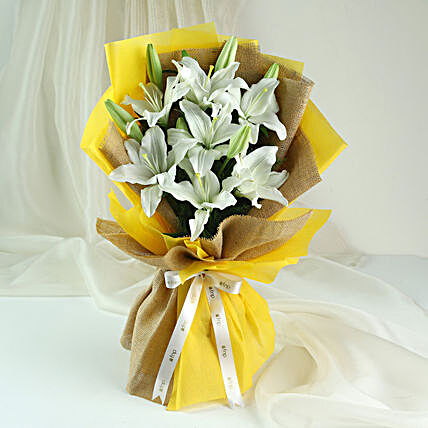 My Angel - One sided Bunch of 6 stems of white asiatic lilies in paper packing.
