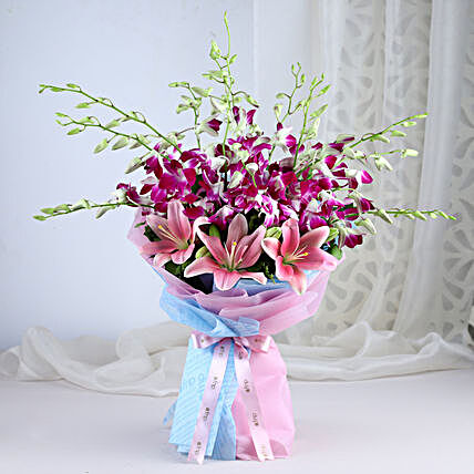 Perfection - Bunch of 10 Purple Orchids with 2 pink lilies in a paper packing.