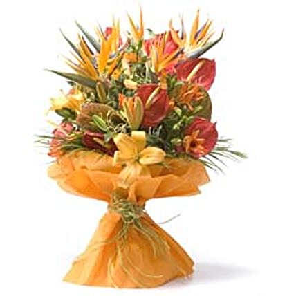 Thank You Bouquet - Bunch of 5 stems of red anthuriums, 5 peach/orange lilies & 5 Birds of Paradise in a non woven paper wrapping.